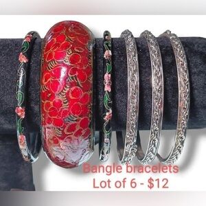 COPY - COPY - COPY - Lot of 40 assorted bangle and clamper bracelets.